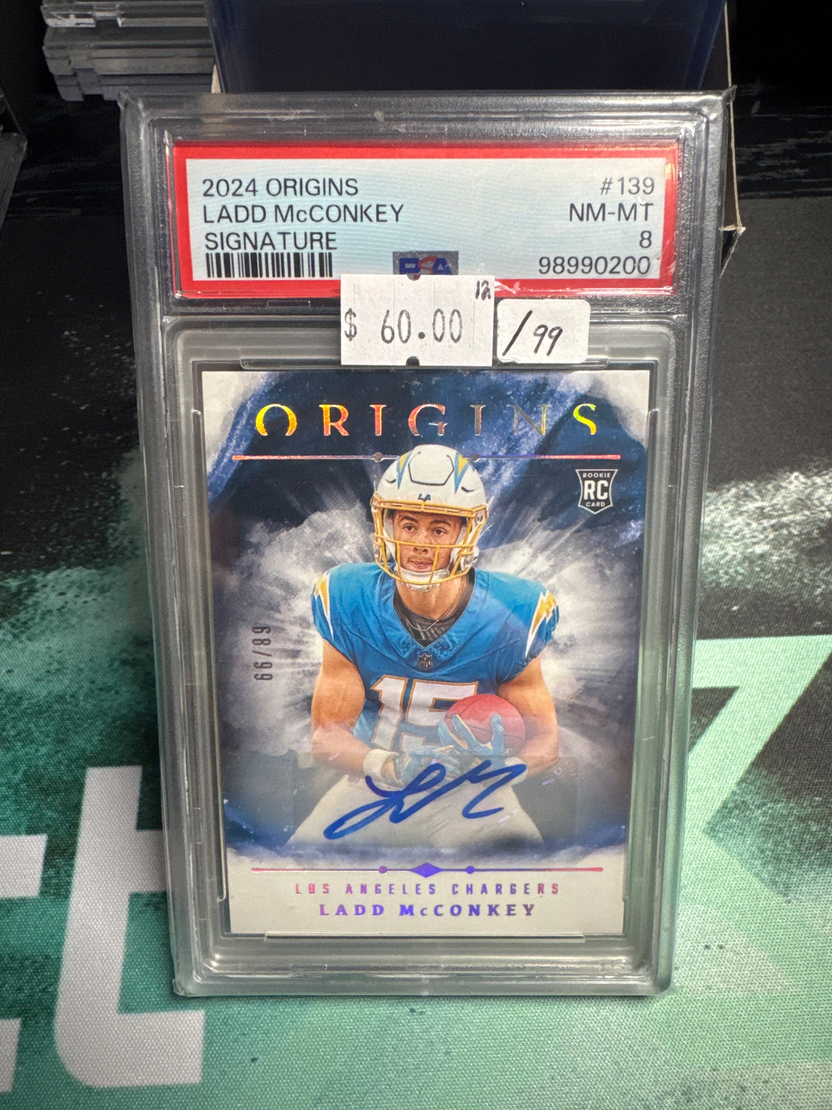 2024 origins Ladd Mcconkey auto /99 PSA 8