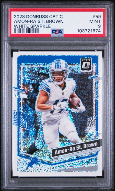 2023 Optic Amon-Ra St. Brown White Sparkle #59 PSA Mint 9-1