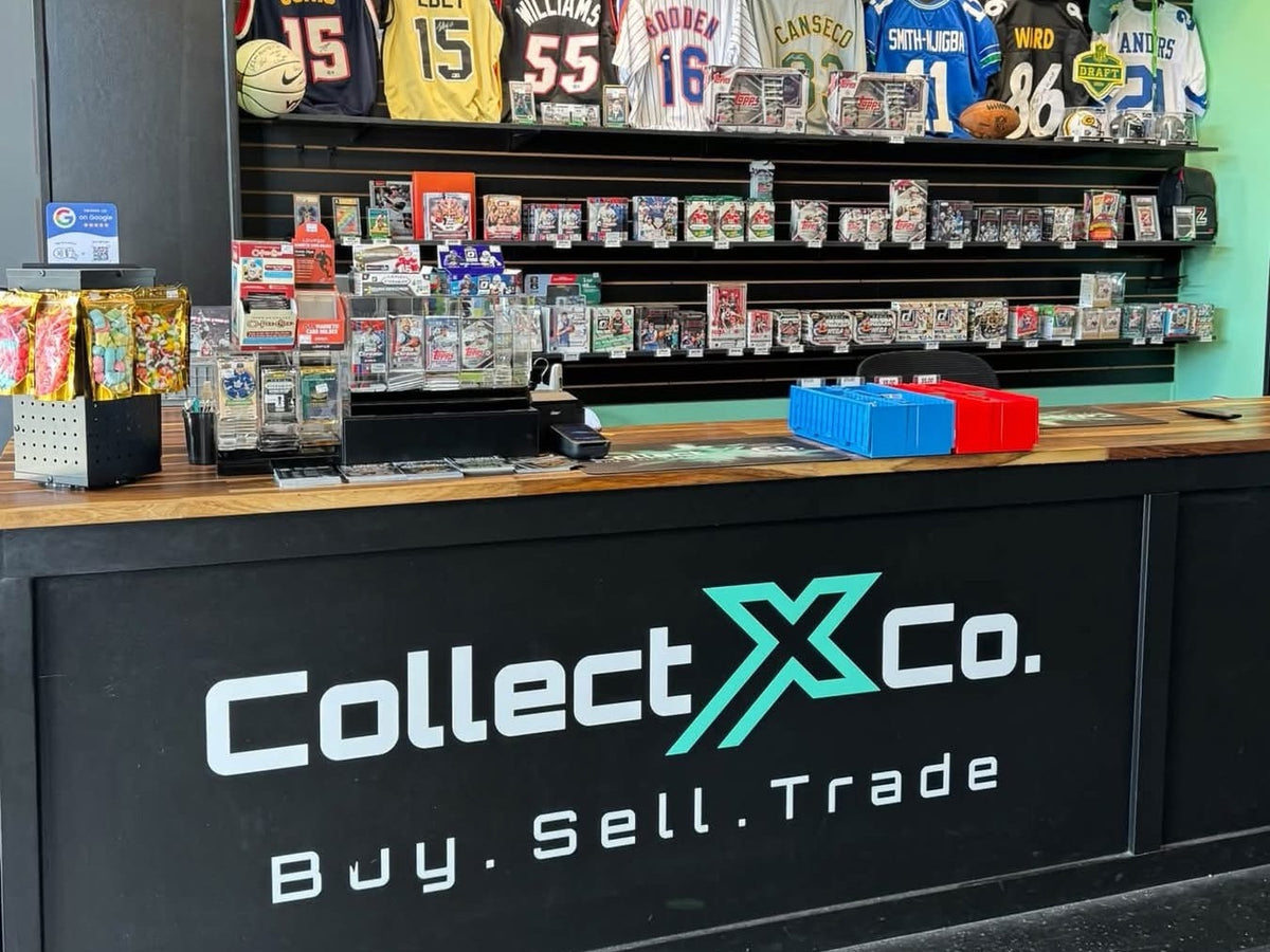 CollectX shop counter with the CollectX logo and trading-card displays